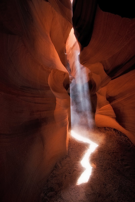 Light beams into an incredibly beautiful slot canyon.